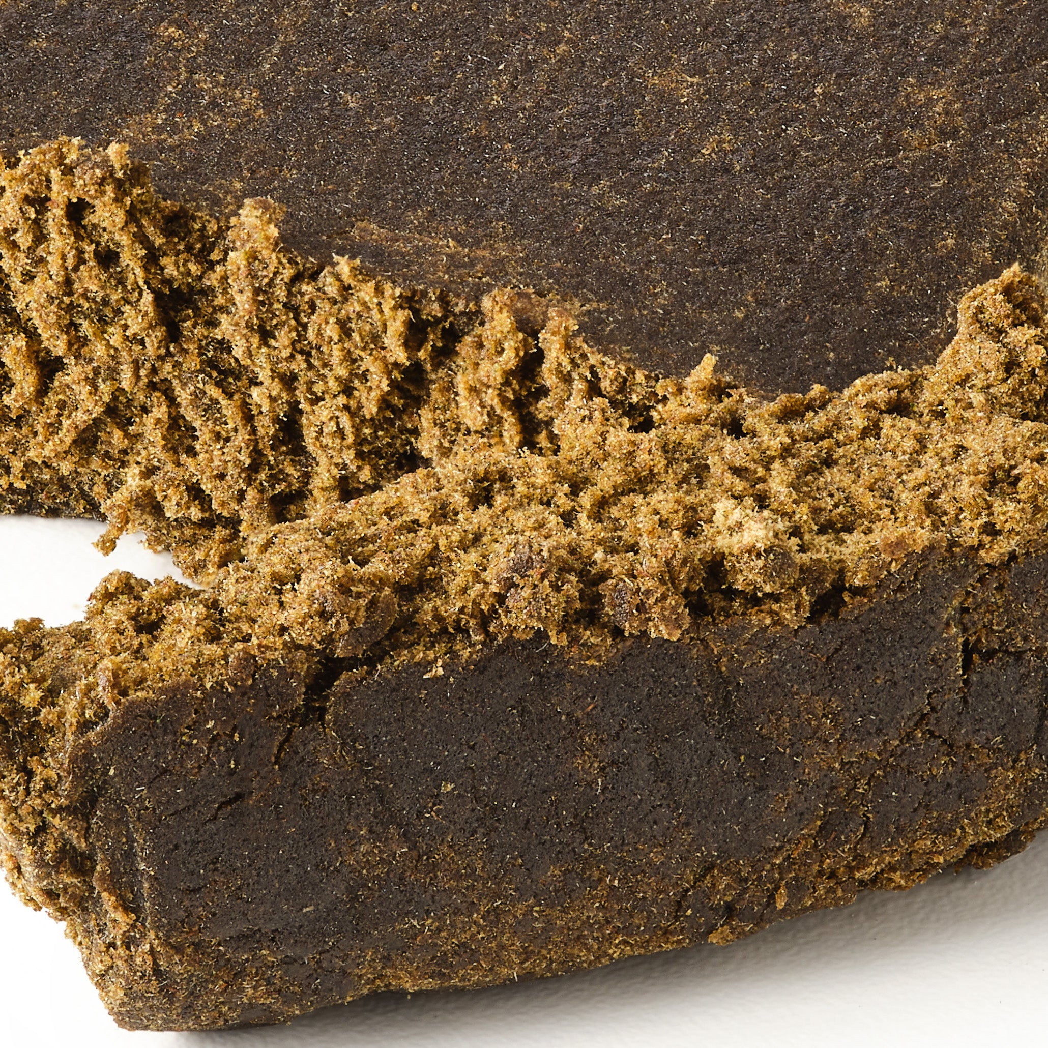 Easy Weed The Filtered CBD hash showing smooth compact hemp hash texture