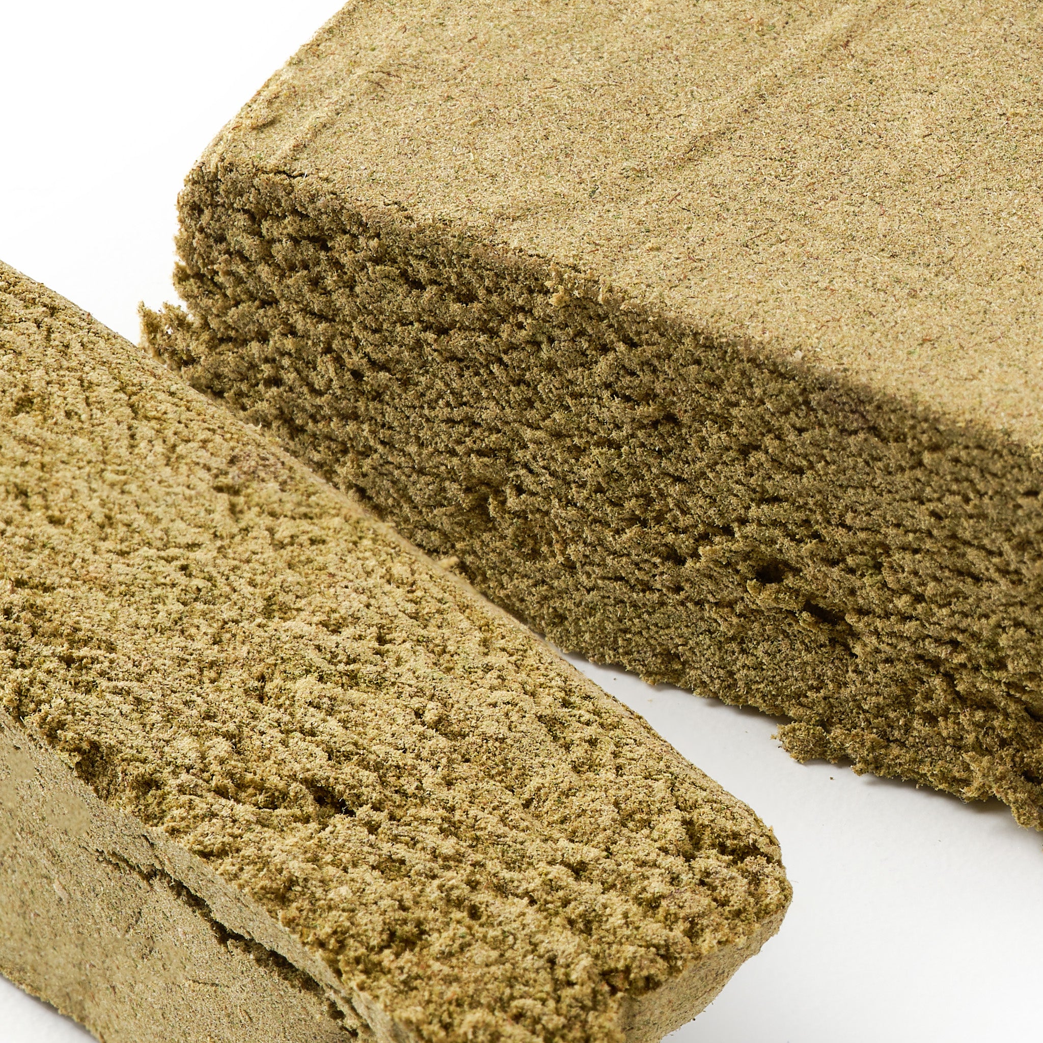 Easy Weed The Yellow CBD hash showing traditional pressed hemp hash with fine sandy texture